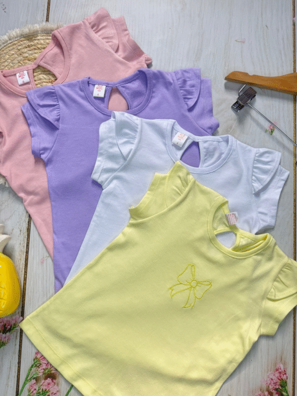 remera de algodón peinado con volados y moño remera de algodón peinado con volados y moño